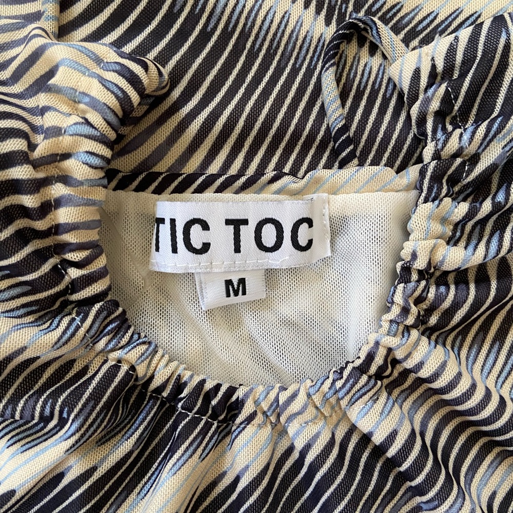 Tic Toc small boutique multicolored (blues and tan) lined pattern mini dress - Picture 3 of 3